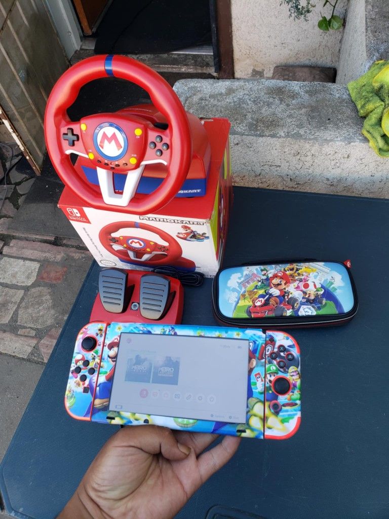 Is Great Series Numbers. None Patched. Nintendo switch 2020 V2 256GB. With 0 Games. A charger & Mario Case. Mario Wheel with pedals brand new $300 or