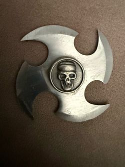 Belt buckle throwing star