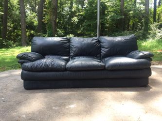 Dark navy blue leather couch