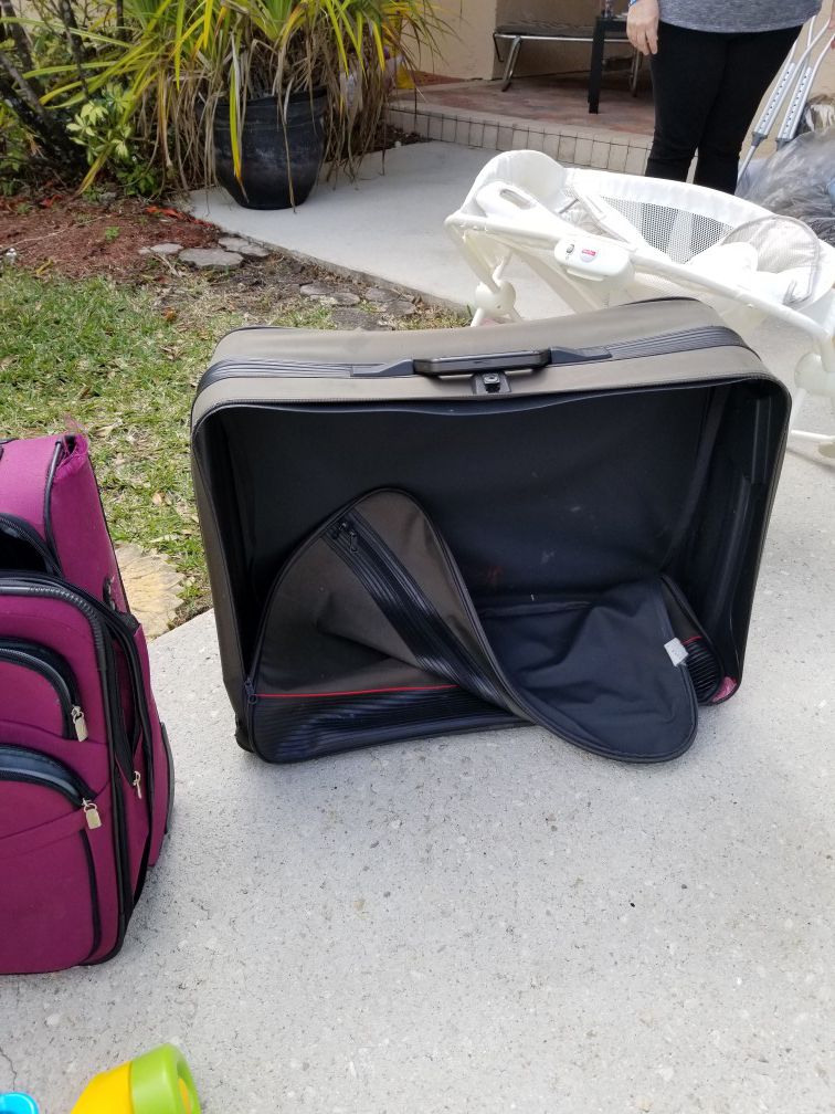 Worn but functional suitcases free. rolling. Clean. Pet free smoke free home