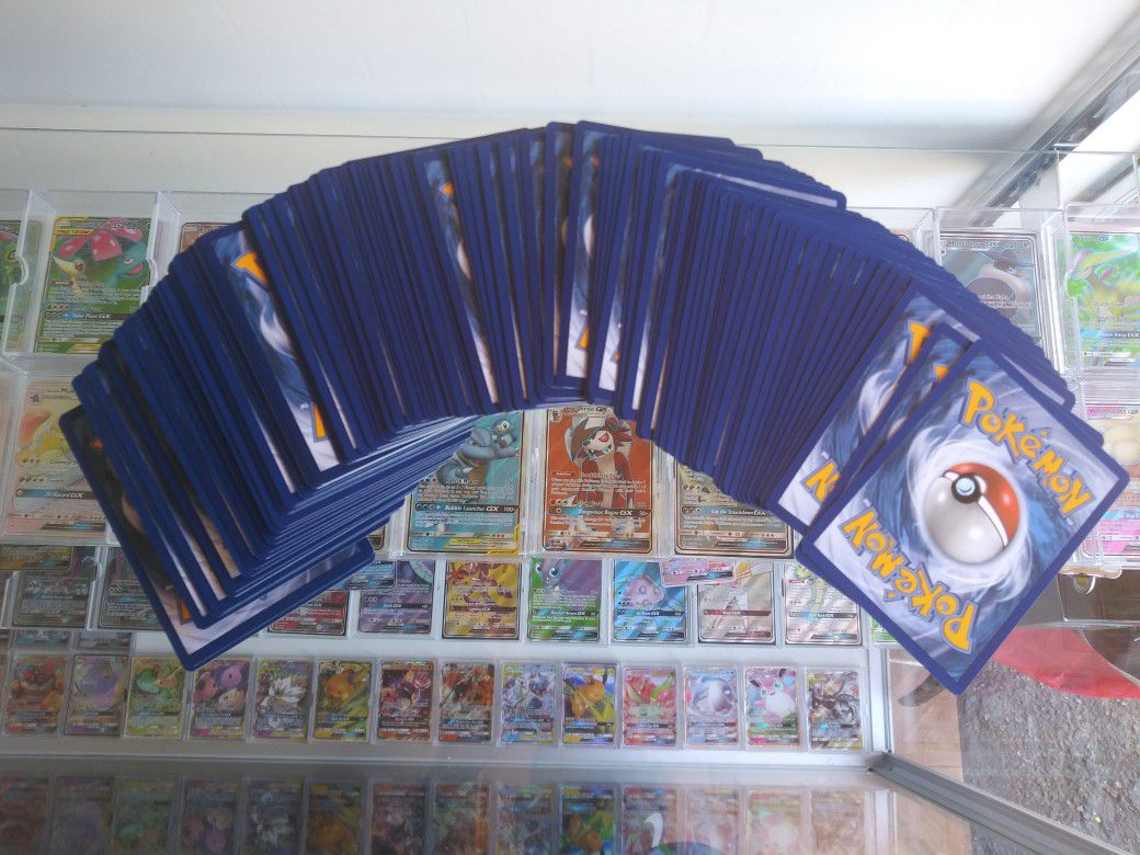 ONE HUNDRED NEW POKEMON CARDS ALL IN MINT CONDITION!!!