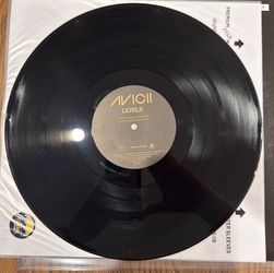 Ultrasonic vinyl record cleaning