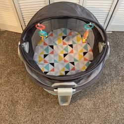 Baby Outside Enclosed Play Area