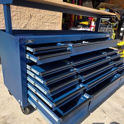 Husky 72 in. W x 24 in. D Heavy Duty 18-Drawer Adjustable Height Mobile Workbench with Solid Wood Top in Matte BIue has small scratches