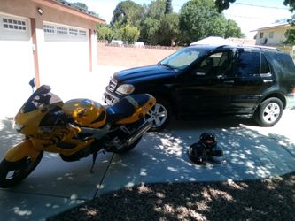 Mercedes Benz(350 limited)  2005 and a 2000 Firestorm(1000cc)