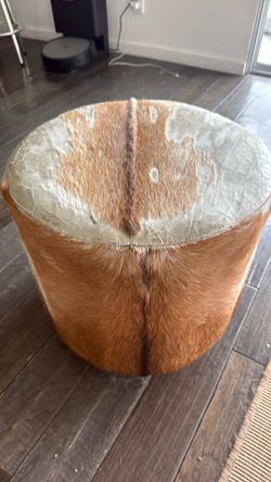 Animal skin ottoman