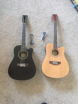 Brand new 12 string electric guitar accessories not included $25 bag $20 for the set of strings good quality