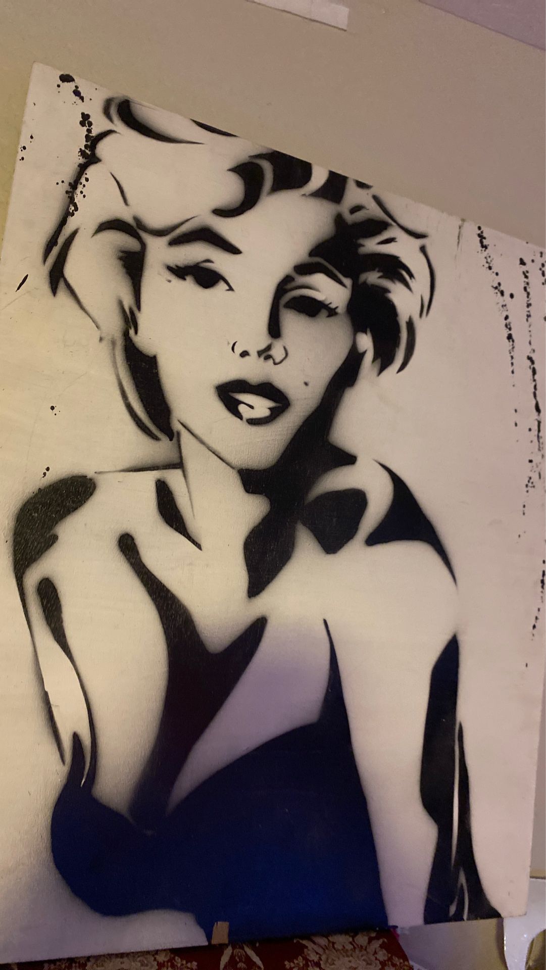 Paintings $200black and white one and $50 Each of the pink ones