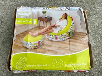 Inflatable chair with footrest