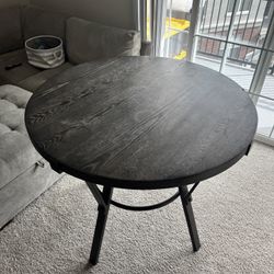 Two chairs and circle dining table