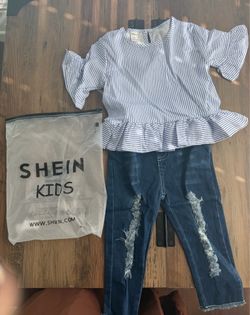 Jeans and blue dressy shirt