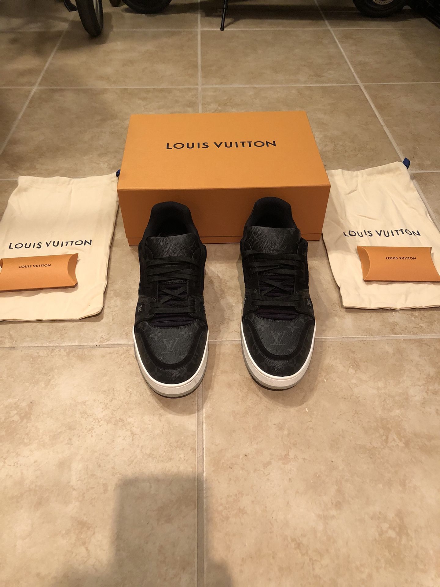 Louis Vuitton Black/White Sneakers Size 12 (Price negotiatable) for Sale in  Oaklandon, IN - OfferUp