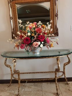 Gorgeous silk flower arrangement on a timeless double handle urn.