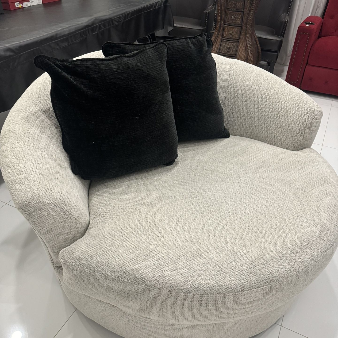 Ashley’s Cambri Oversized Swivel Chair - Originally $950.    Asking $250