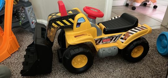 Fisher-Price Big Action Load N Go Ride-On with Lights, Sounds, Storage and Walking Bar