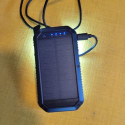Solar charging bank with light