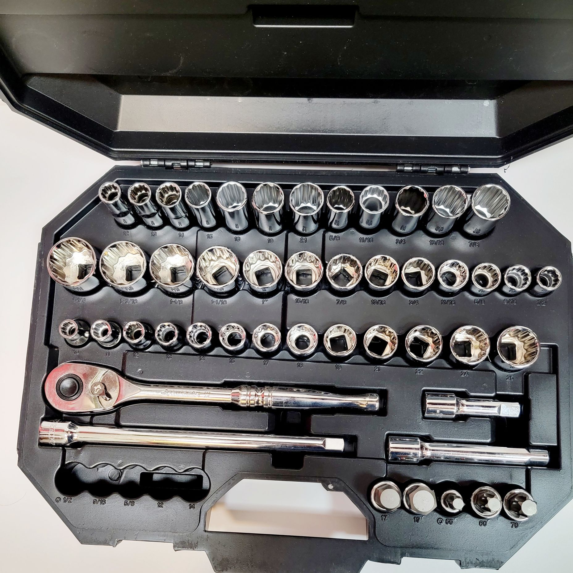Husky socket set. Has a 1/2 inch drive ratchet, 26 standard sockets, 12 ...