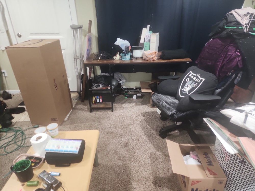 Moving Out Of My house. There's A Black Glass table,a Little Coffee Table, A Big Work Desk.