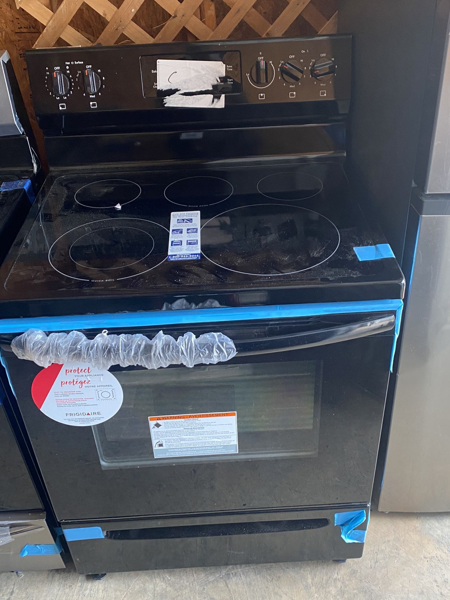 Brand new Frigidaire oven with GE over the counter microwave