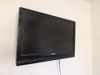 Two TVs with wall mounts