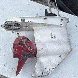 Johnson 70 hp 2 stroke lower unit works perfect pumps good water