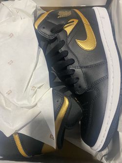 black and gold jordan 1