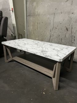 Faux White Marble Top Coffee Table With Small Chip