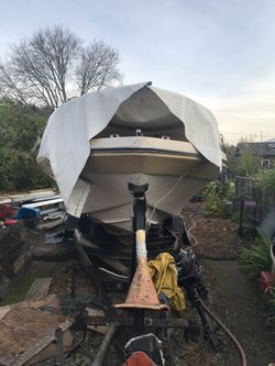 Deep v cabin cruiser boat with trailer 1970s