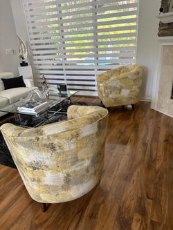 2 yellow living room chairs