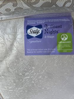 SEALY BABY MATRESS IN OUTSTANDING CONDITION Cover Included