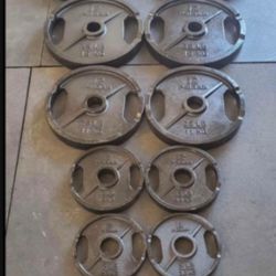 300lb Olympic weight set with barbell and clips