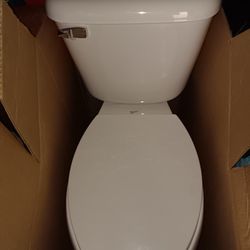Mansfield toilet w/seat cover