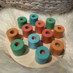 Lovevery Wooden Stacking Peg Board.