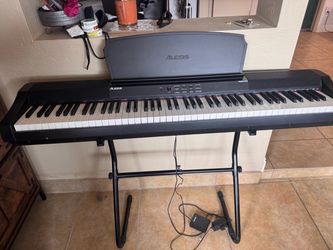 Alesis Prestige 88-Key Digital Piano w/ Stand & Pedal – $250