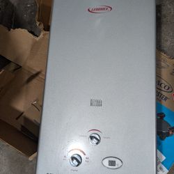 Tankless Water Heater Gas  25Kw Perfect For A Trailer Home Or RV Home Is Battery Very Nice Condition Like New I Only Used For  Half Year 
