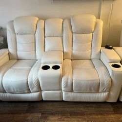 White Powered Recliner Loveseat And Single Seat.