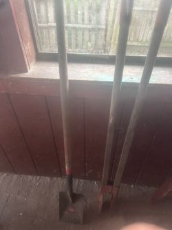 Post hole diggers and tear off shovel