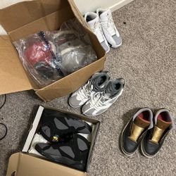 4 pairs of jordan’s and box of hats