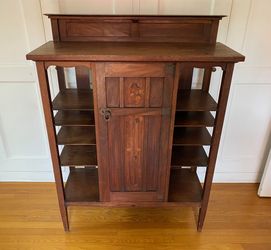 Vintage unmarked Stickley Mission-style curio cabinet