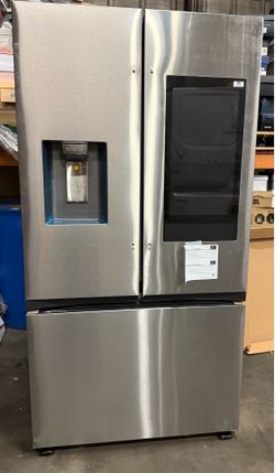 Brand new silver refrigerator & freezer with water