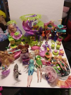 Two full-size fairies as well as furniture small dolls clothes and Extras all the seen in the pictures