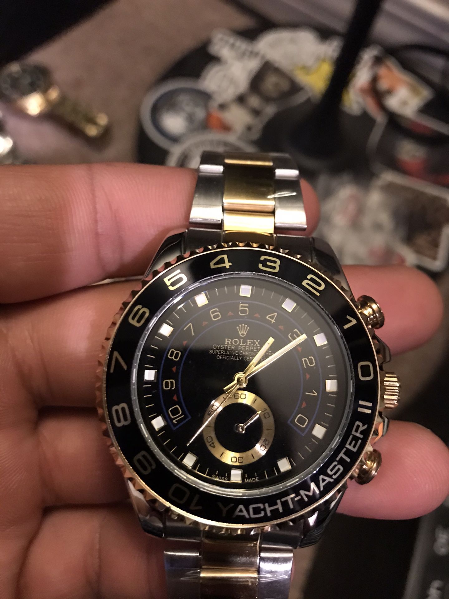 Men’s black and gold watch