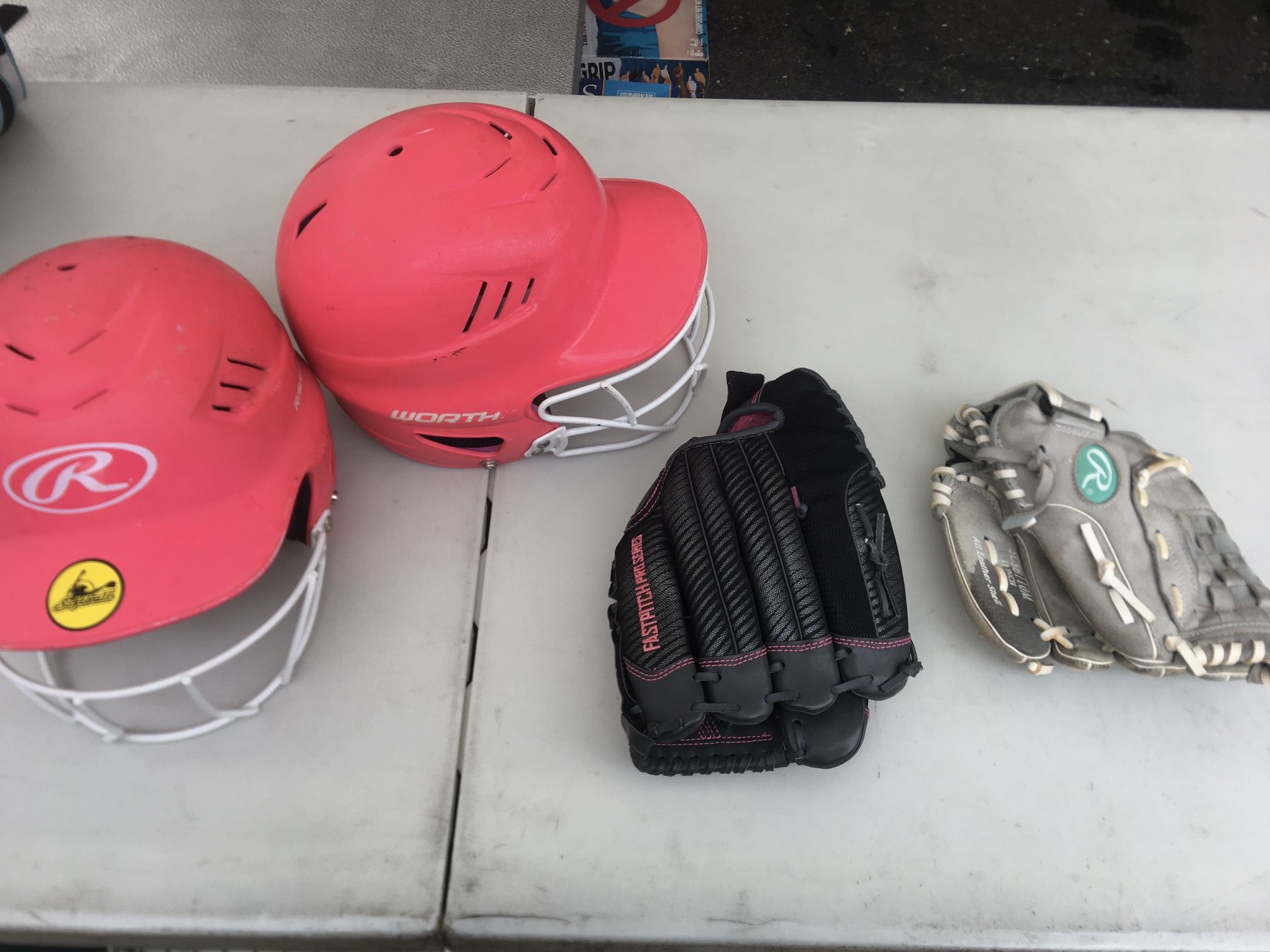 Girl’s Softball Gear - Worth & Rawlings Helmets, Rawlings & Franklin Fast Pitch Pro Series Gloves - $25.00 Each