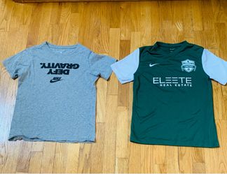2 Nike Boys L Shirts : Defy Gravity' Nike tee and a green Milltown United jersey. EUC