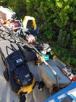 Four lawn mowers