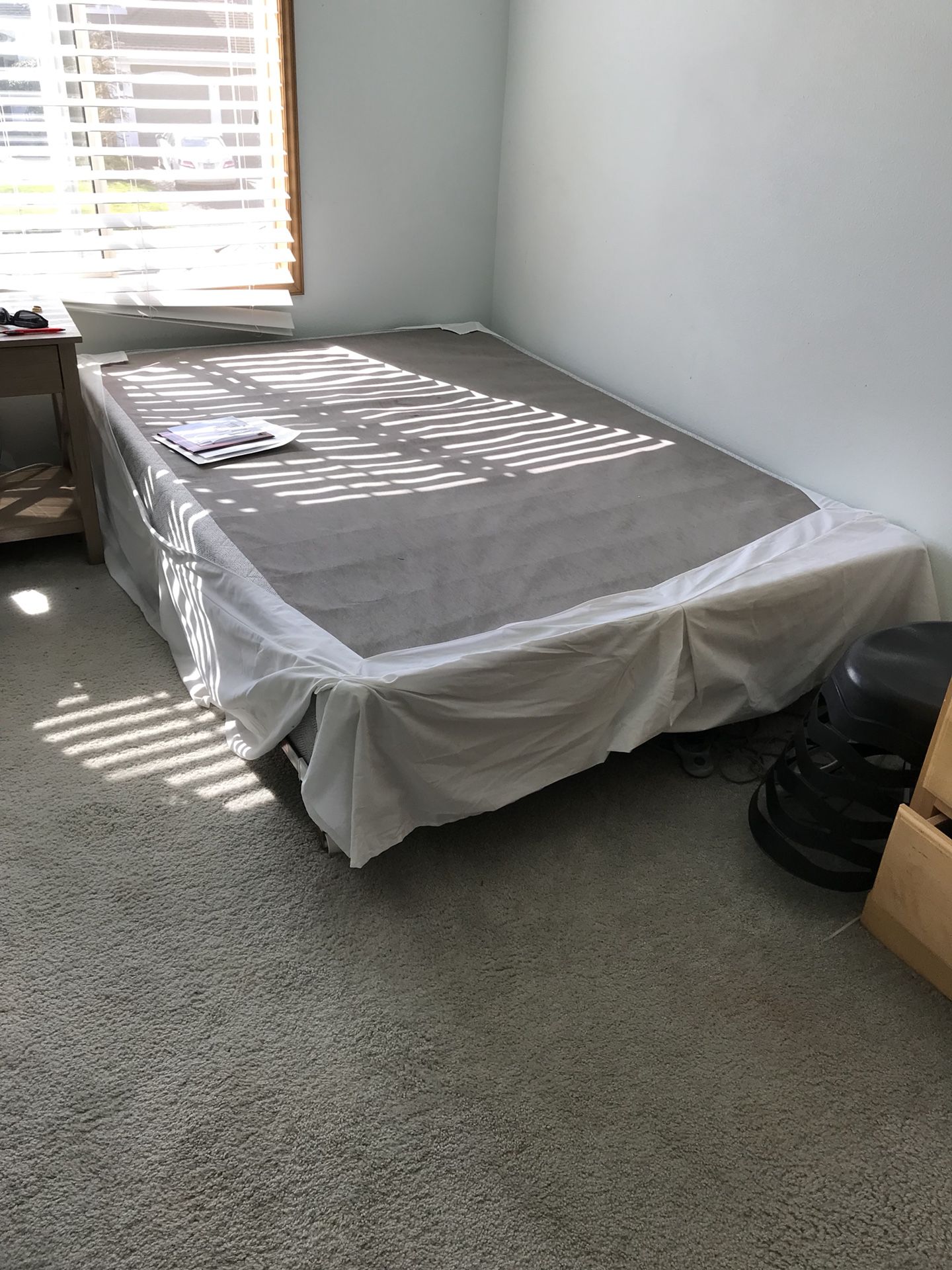 Full size box spring and bed frame.
