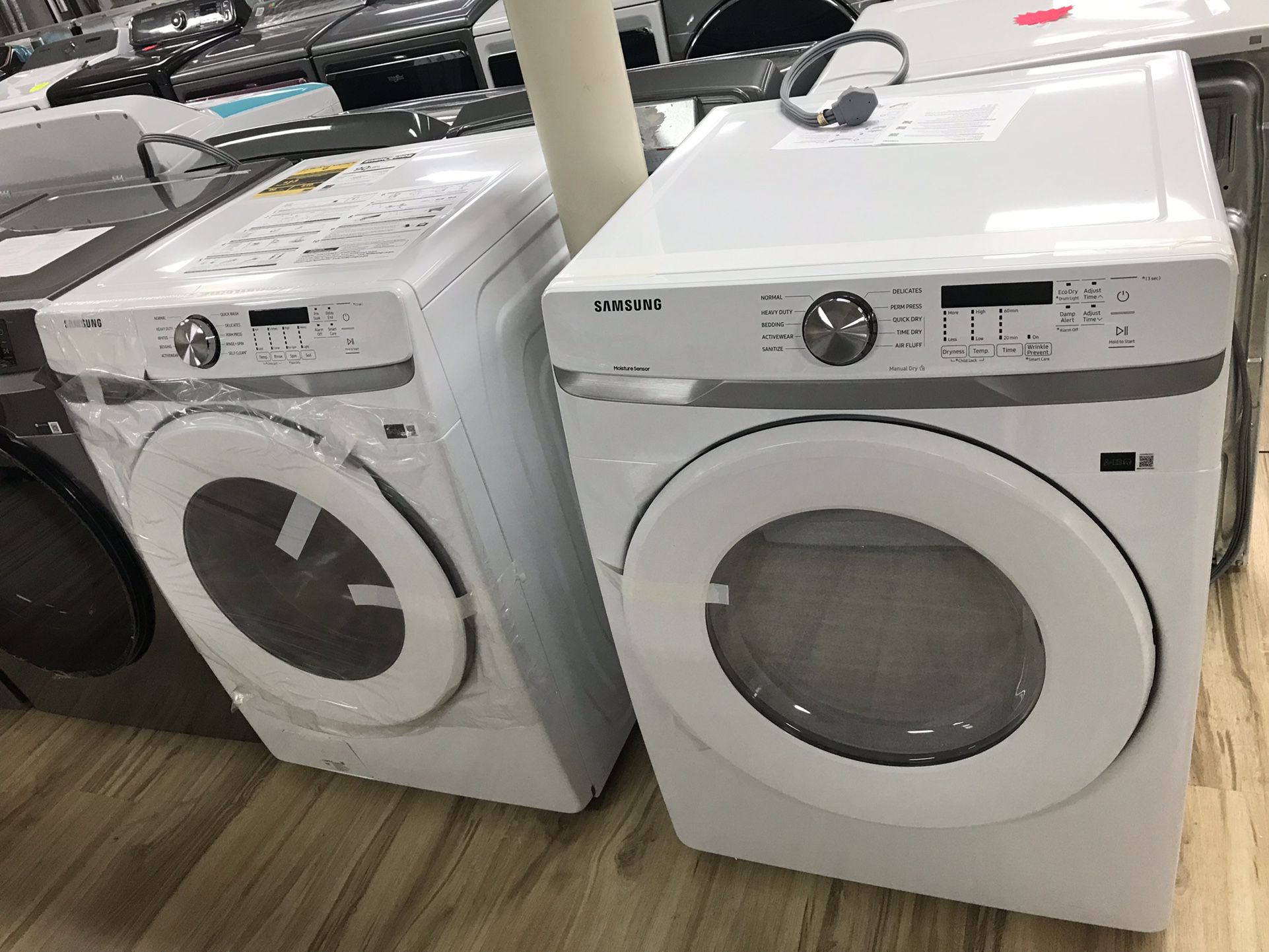 Samsung washer and dryer set in white