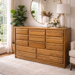 Gorgeous brown dresser with 13 drawers in excellent clean condition heavy duty and large. 