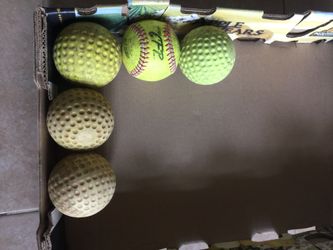 Five softballs