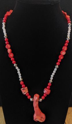 $10. Red coral necklace with coral pendant. 18 inches. Pendant is 2.25 inches long. Magnetic clasp.